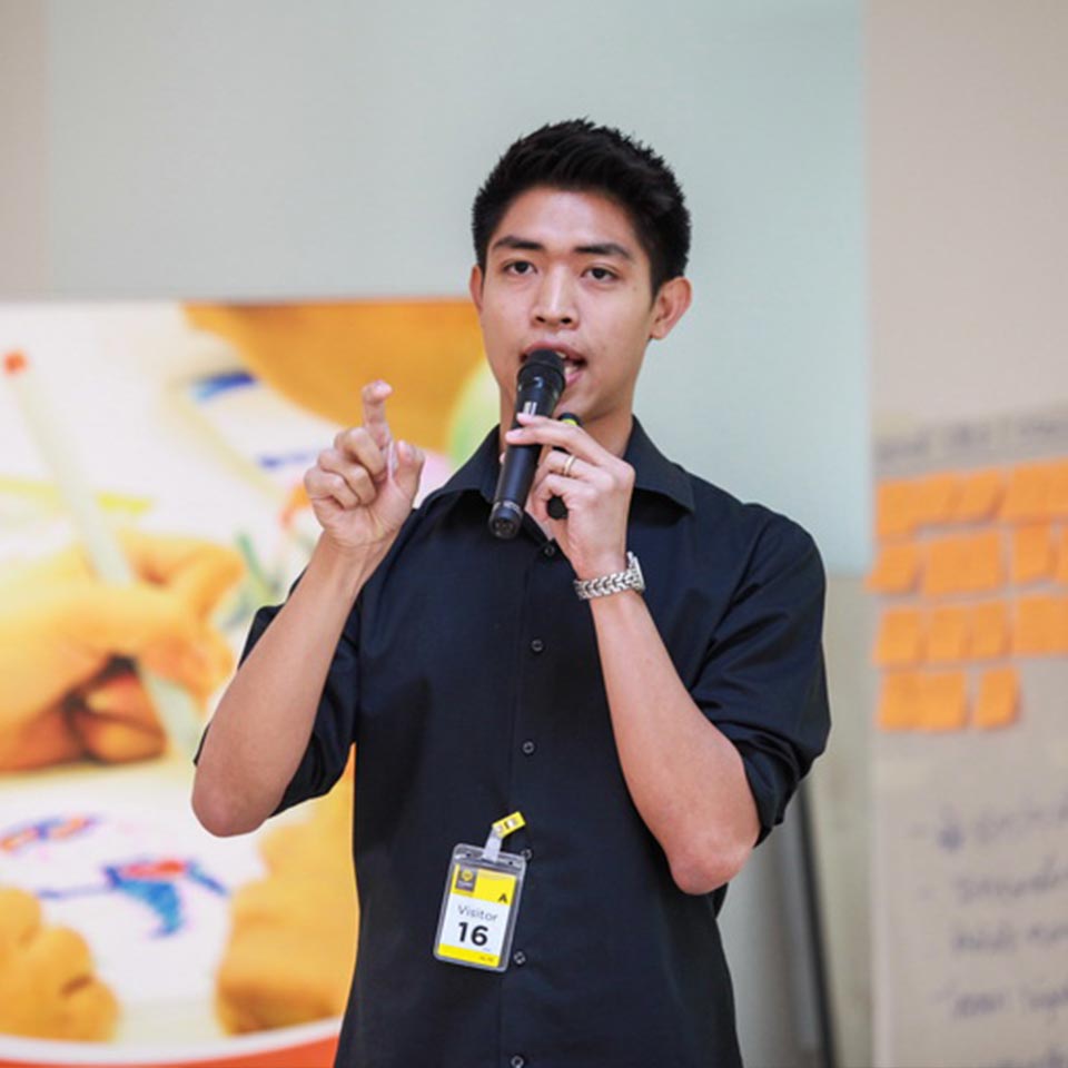 Dr. Tem speaking at a Thinkergy workshop