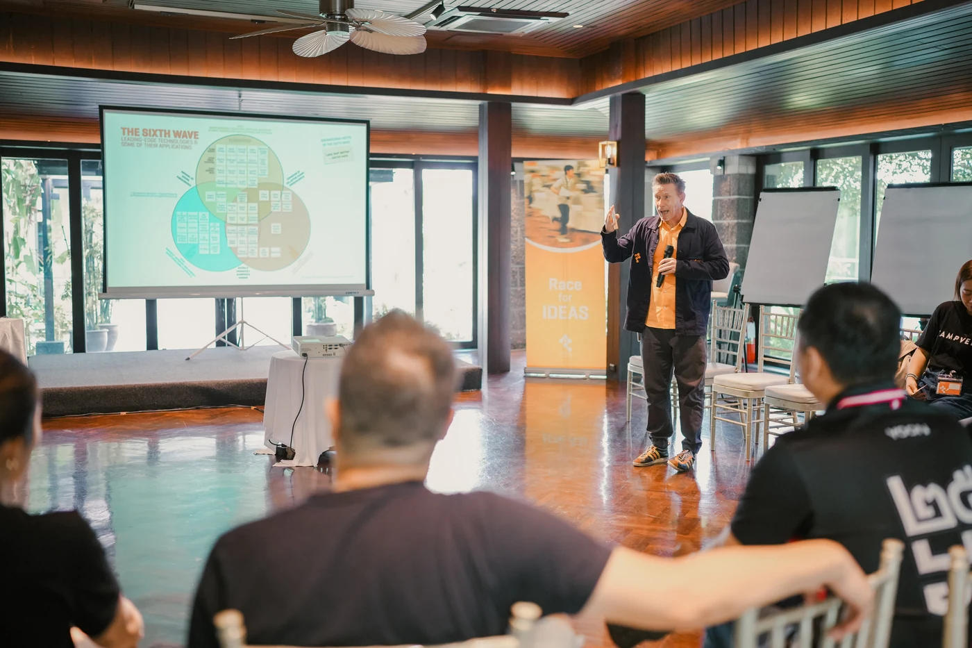 Dr. D presenting to the Ampverse team during the TIPS workshop