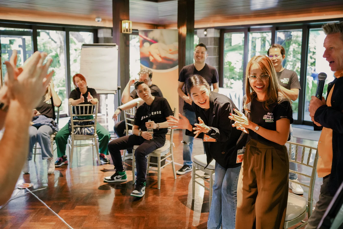 Ampverse team members in a TIPS exercise while Dr. D moderates