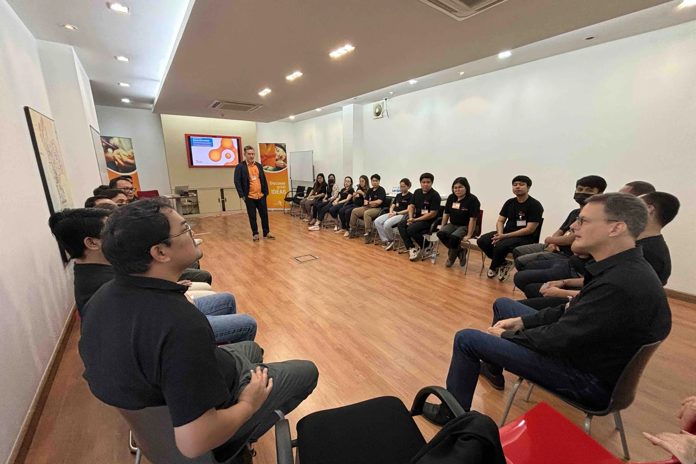 Ruwac Asia team seated in a circle at the start of the TIPS workshop in Chonburi