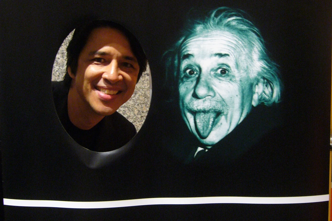Thinkergy photo banner with a face cut-out next to a portrait of Albert Einstein