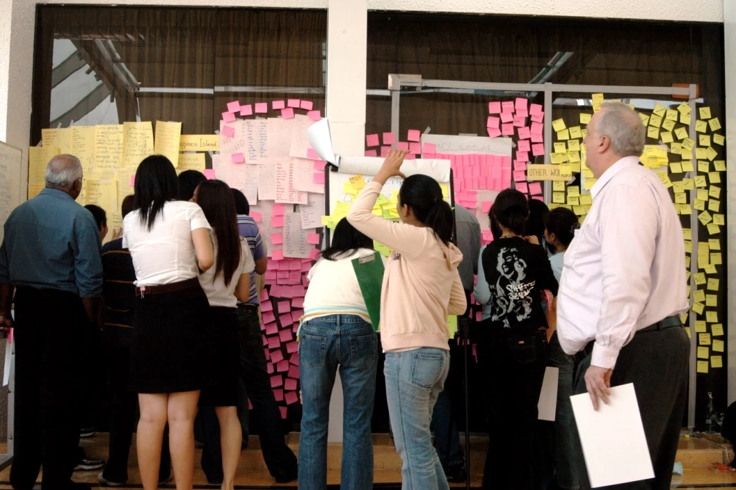 Merck Thailand participants browsing the idea walls for the most intriguing raw ideas