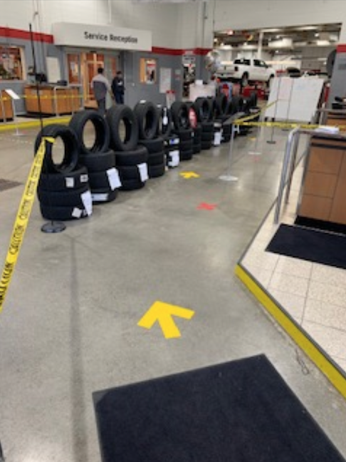 A safe, one-way flow in a Canadian car dealership and repair shop