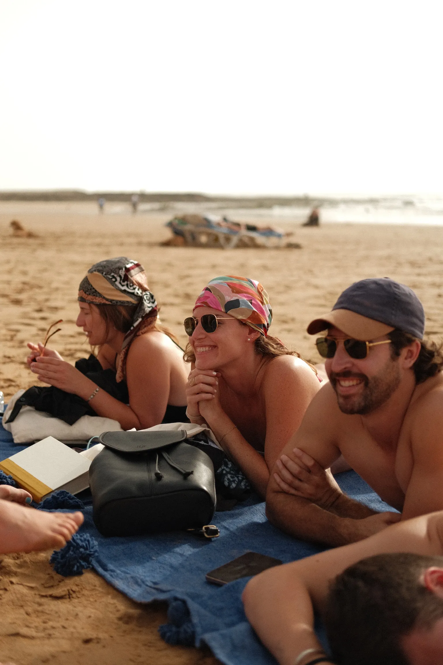 Group of digital nomads relaxing poolside in the desert