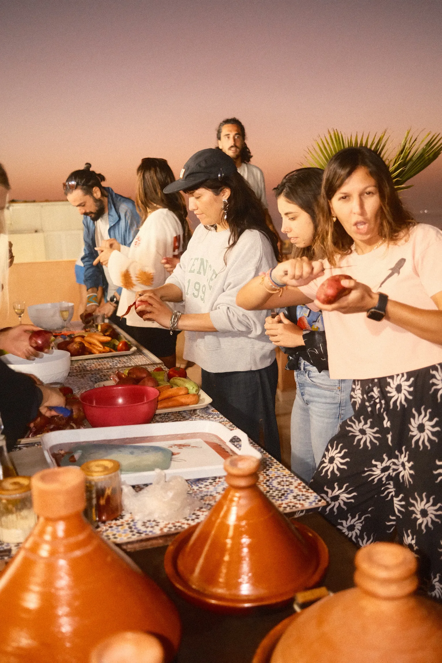 Digital nomads watching dolphins at sunset on Pipa beach