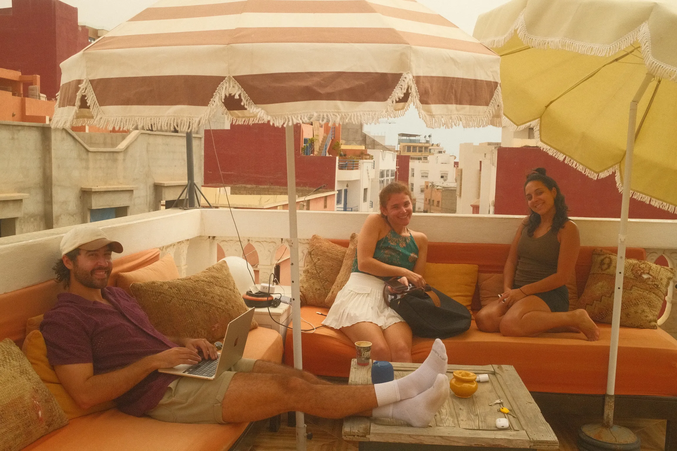 Group coworking session inside Casa Basilico’s open-air workspace Marocco