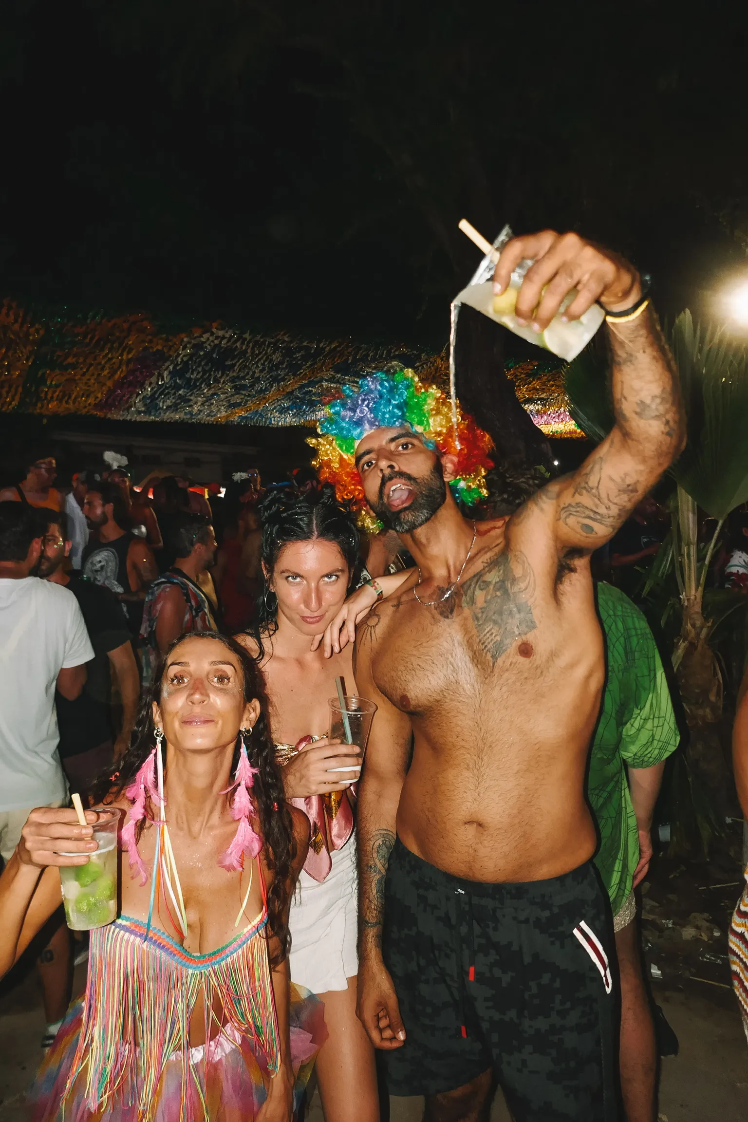 Digital nomads dressed in costumes during Carnival in Pipa, Brazil