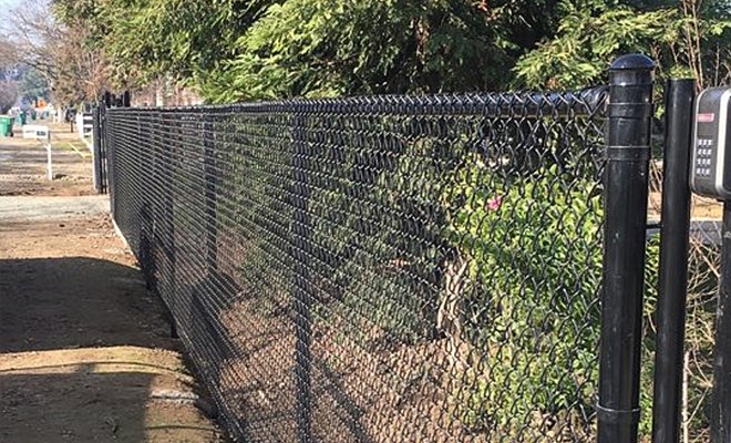 Six-foot black vinyl-coated chain-link fence