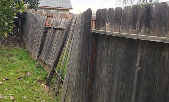 Storm damage to fence gate