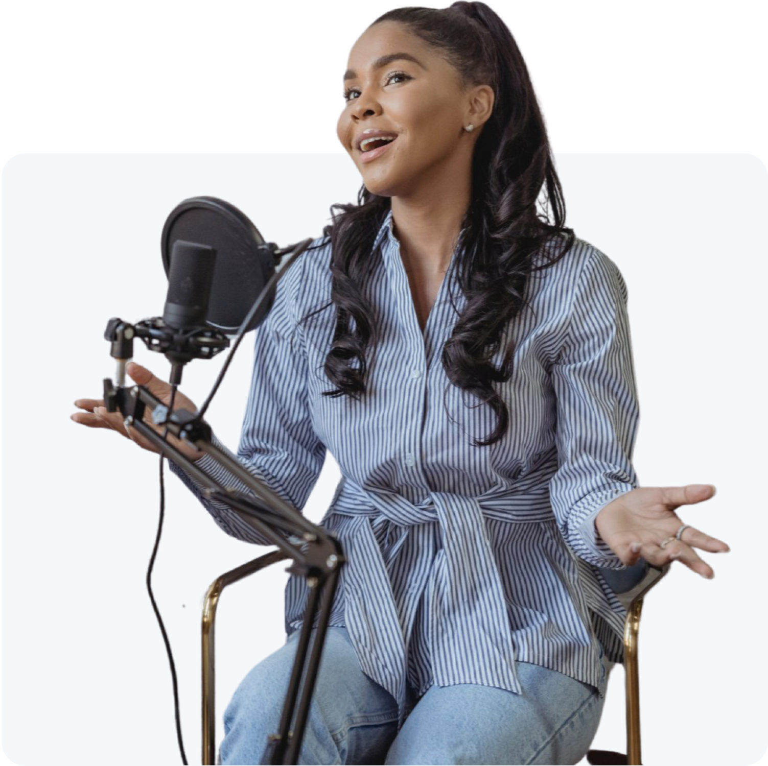 Woman sitting in front of microphone