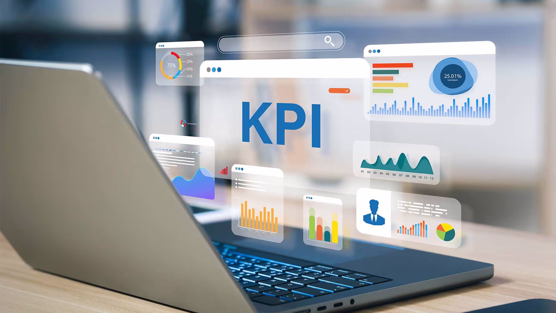 Laptop with images of graphs around the word KPIs