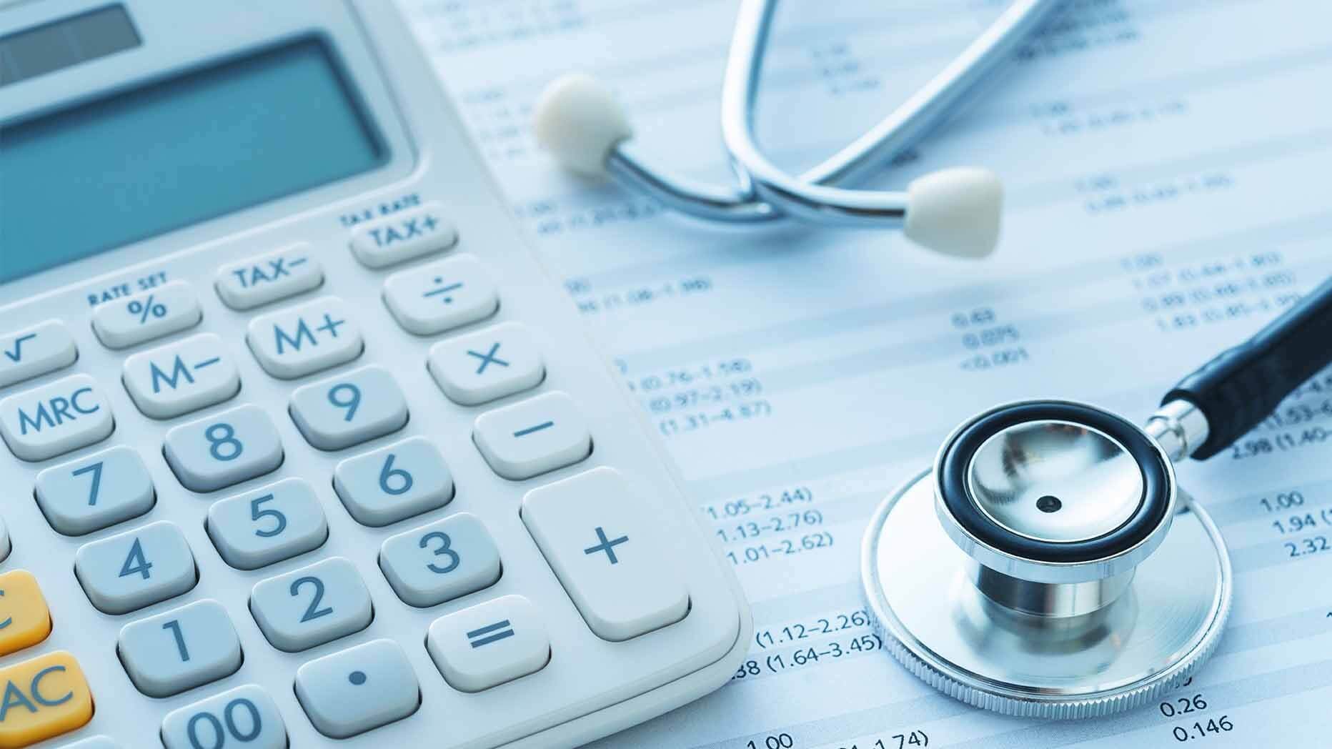 Stethascope and money depicting healthcare costs