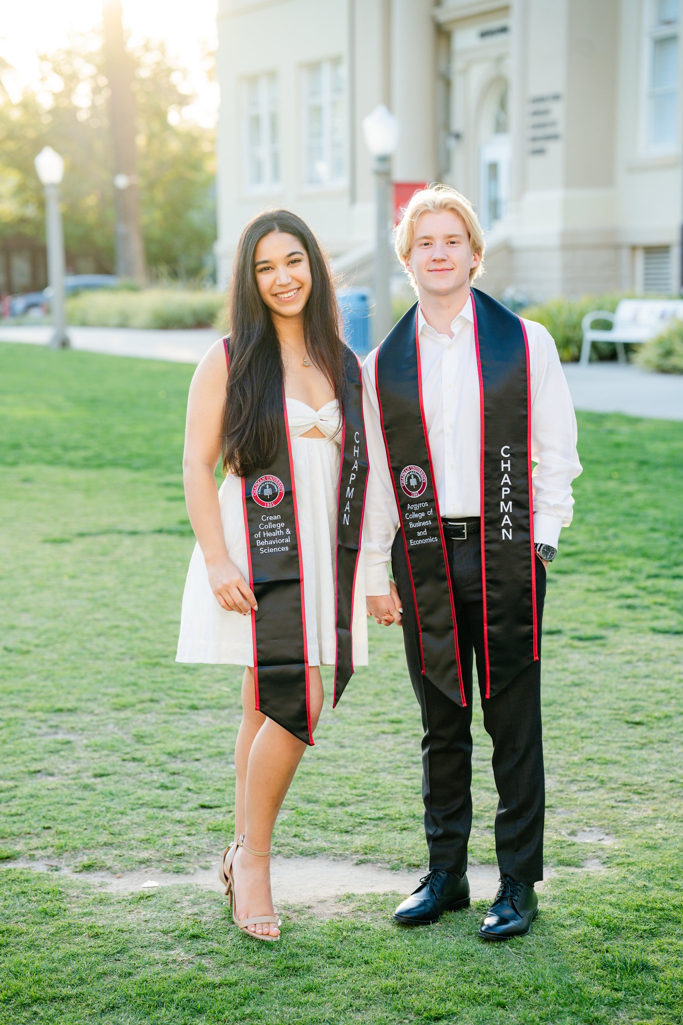 Chapman University Graduation Photo of a couple in front of Memorial Hall 