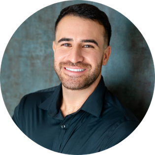 corporate headshot white young man wearing blue