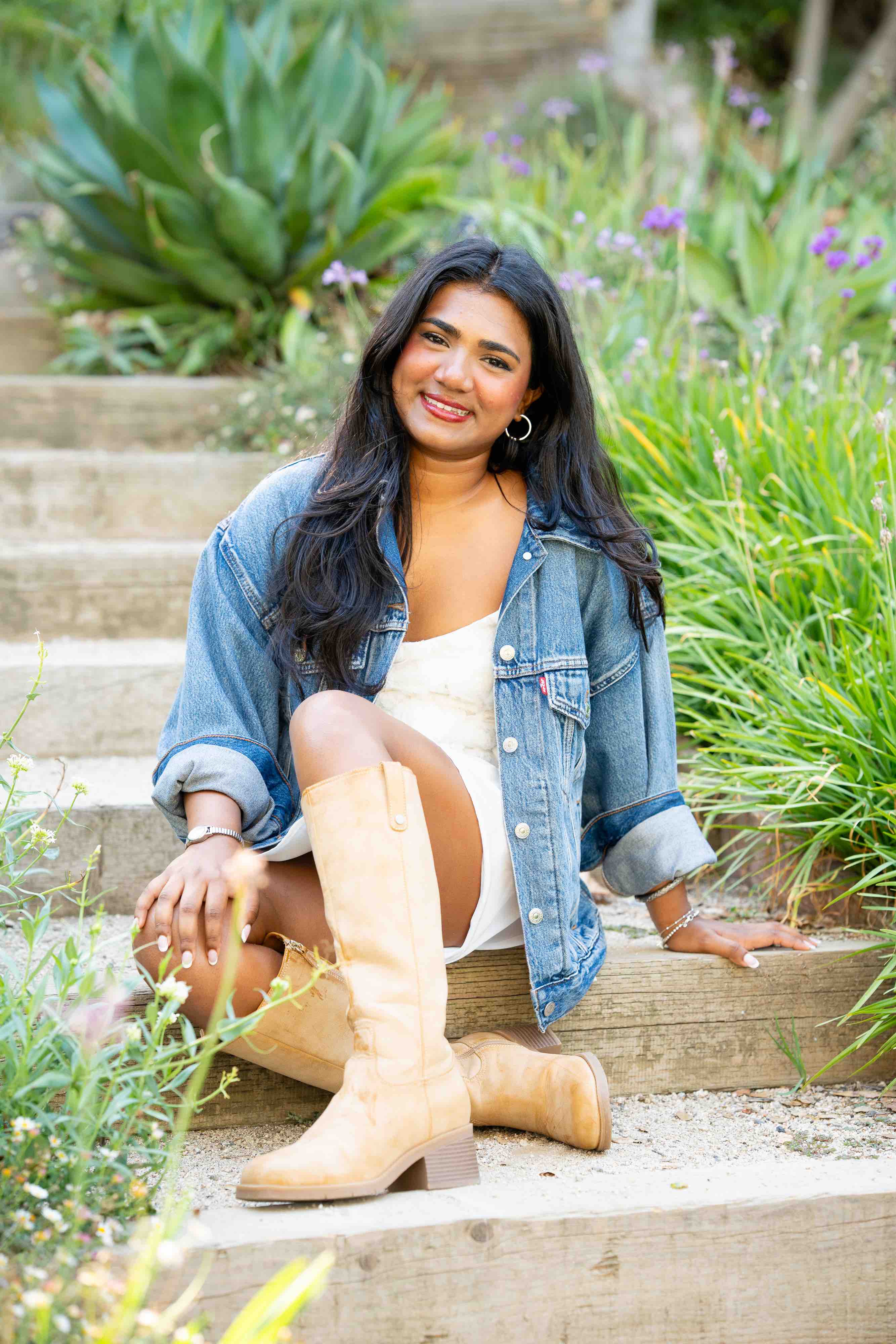 Senior Graduate sitting in garden