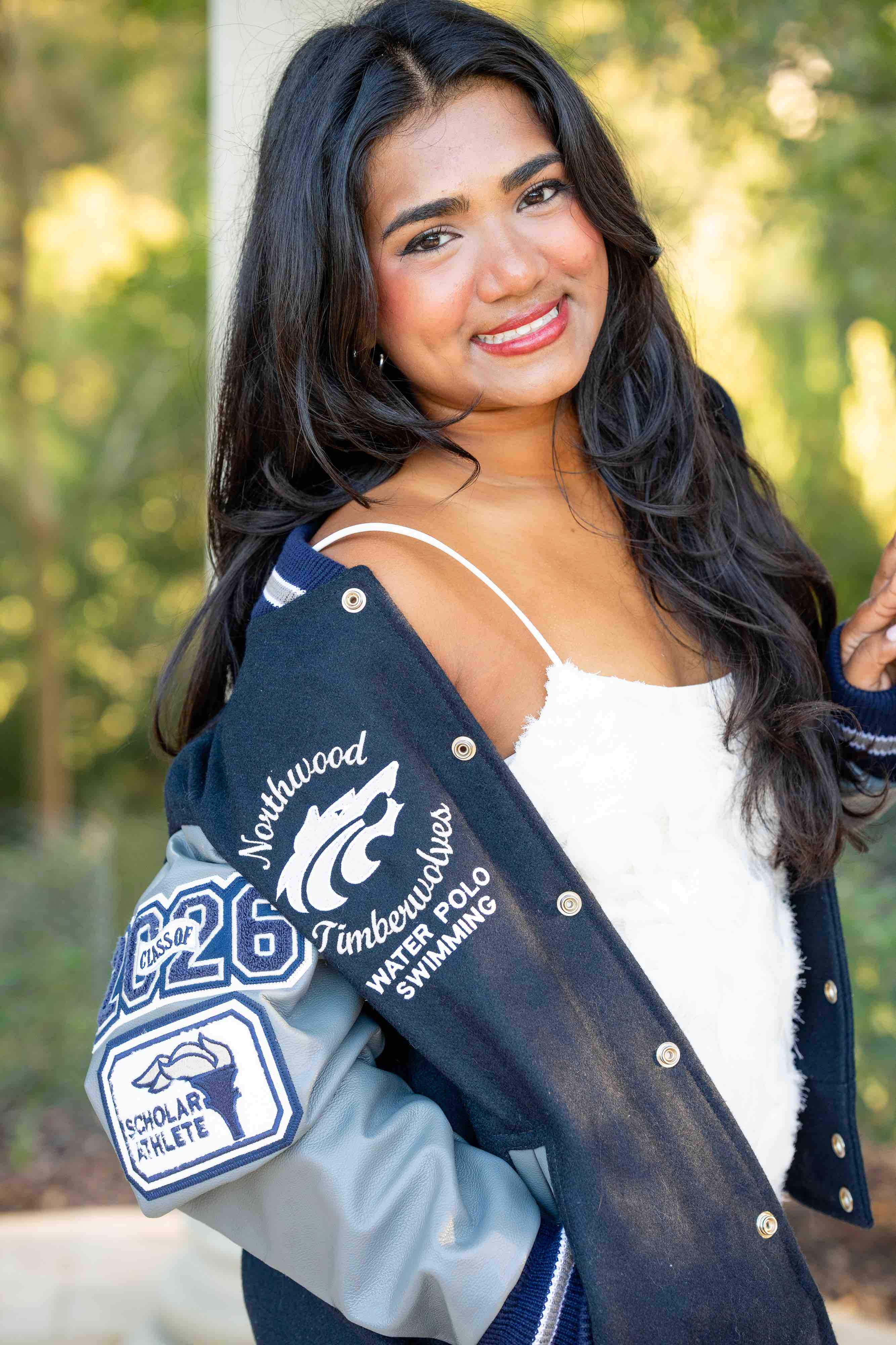 High School Graduation photo girl in varsity jacket