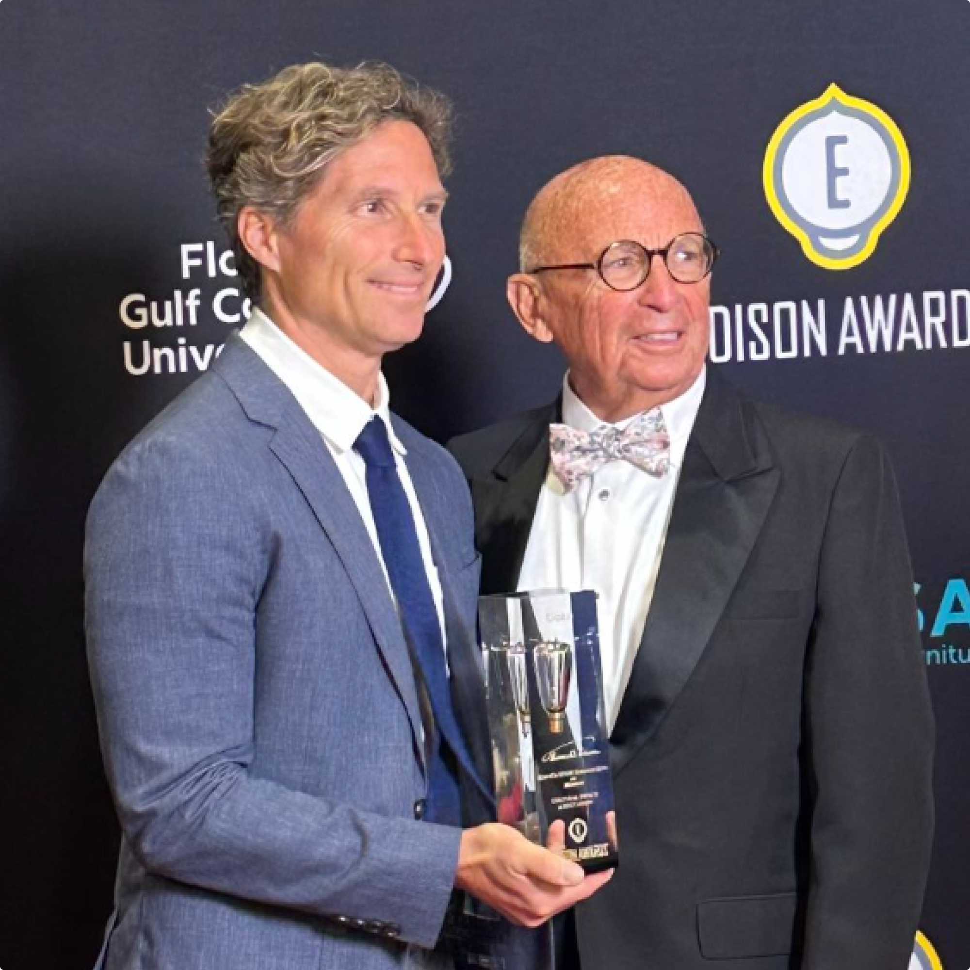 Scot and Walter accept an Edison award for their design work for KiwiCo.