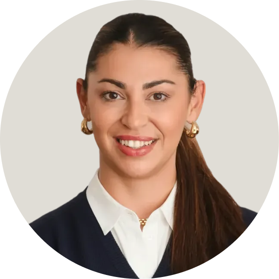 woman with long brown hair smiling headshot