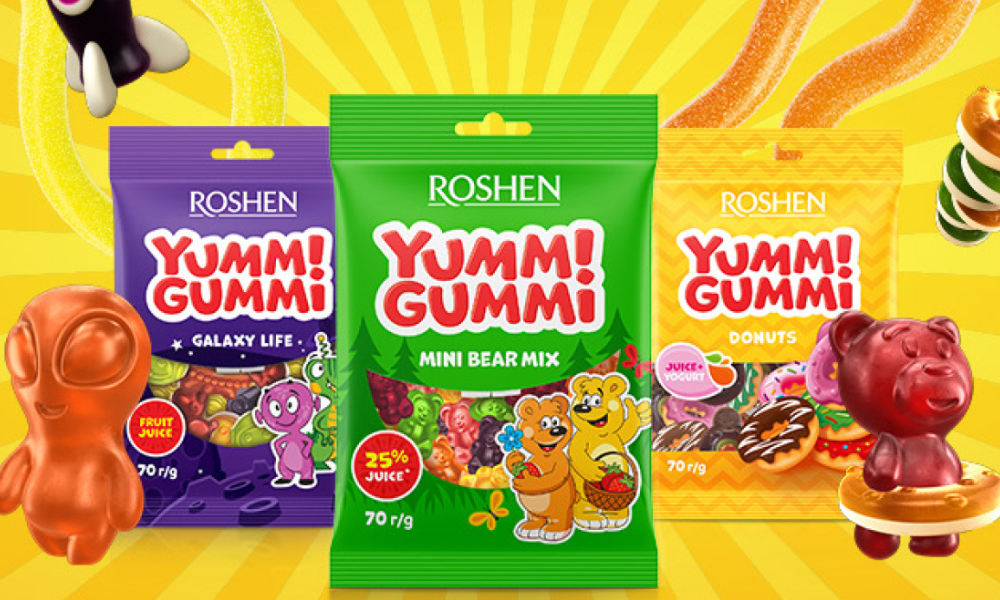 Tres paquetes coloridos de dulces Yummi Gummi