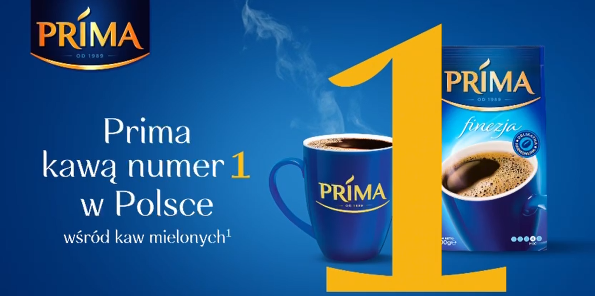 Paquete y taza de café Prima en un anuncio en polaco
