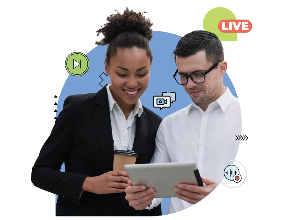 a couple of men looking at a tablet