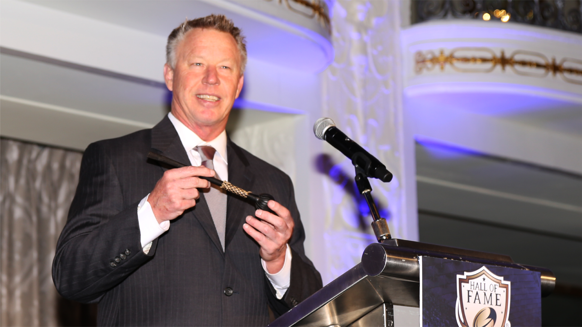John speaking at an event