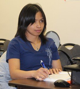 Outpatient student paying attention in class.