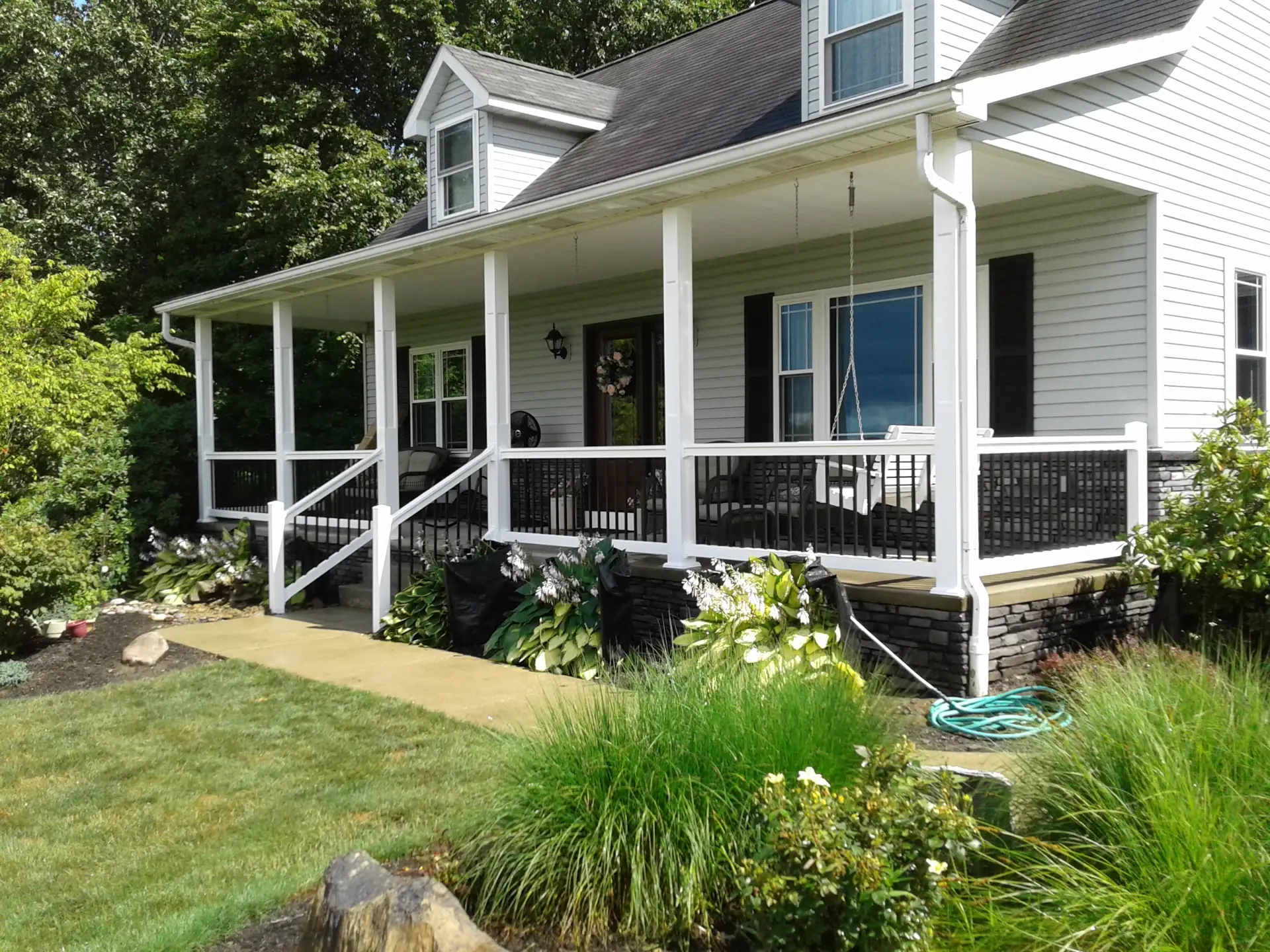 aluminum railing on front porch of house