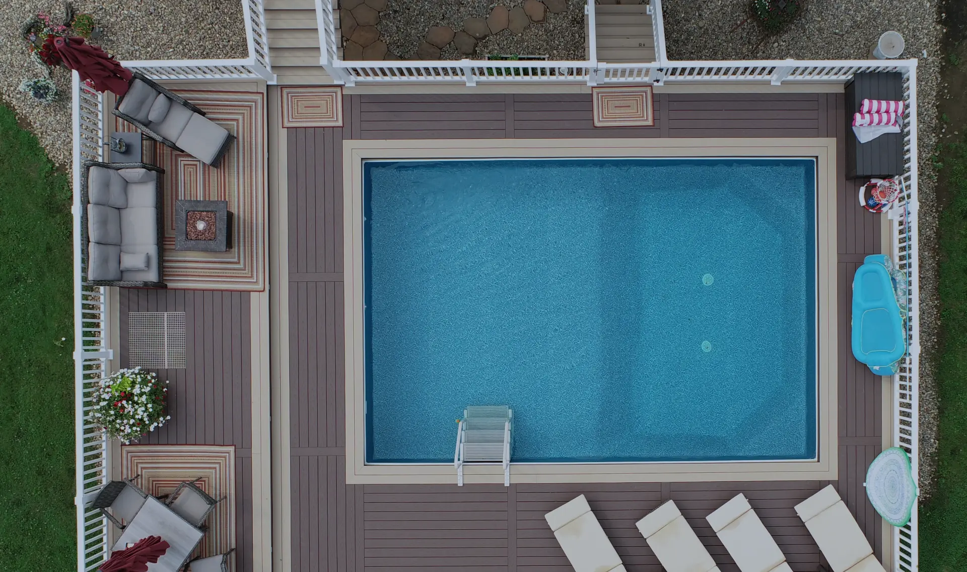 deck around pool with blue gray overlay