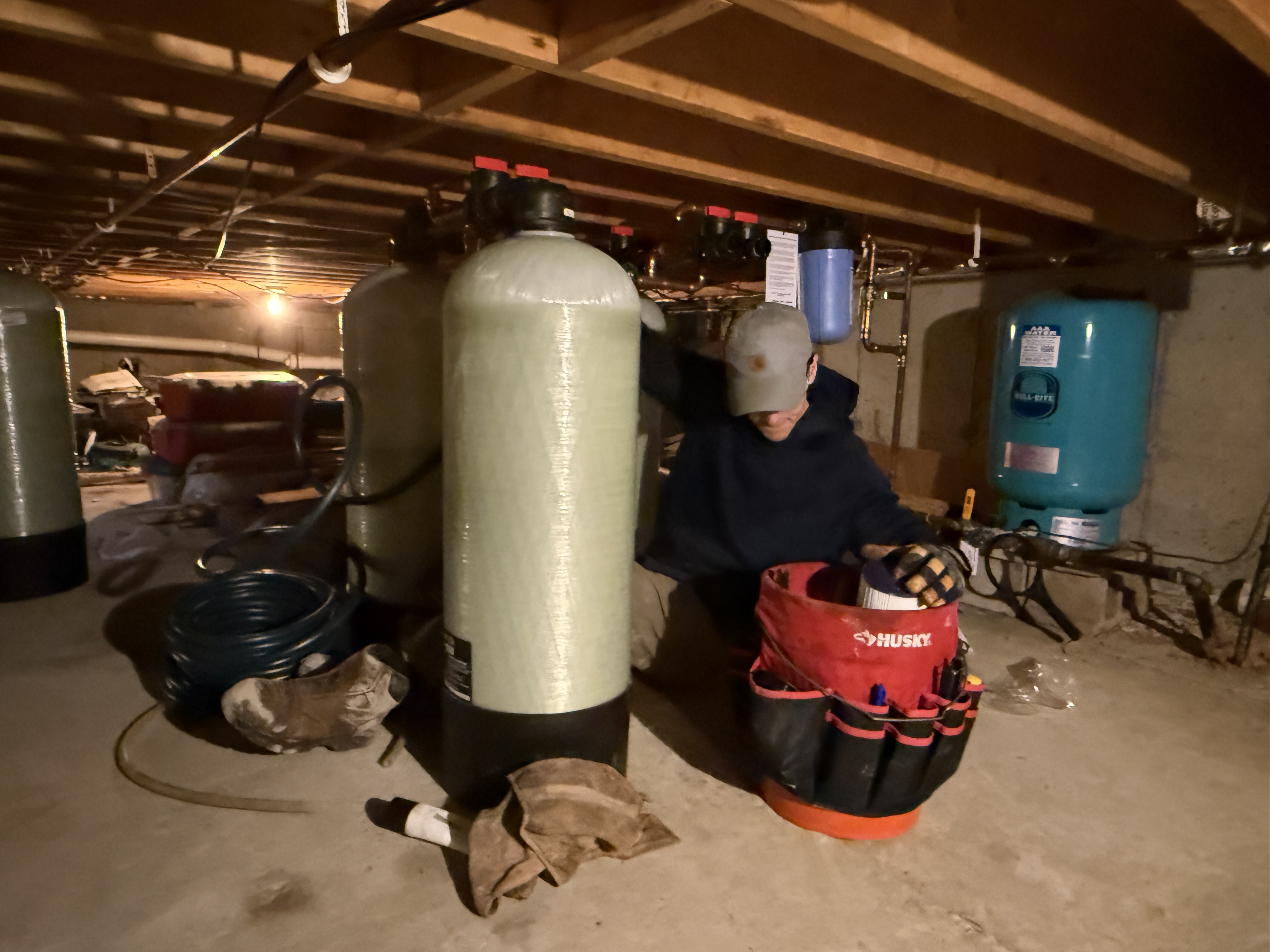 A & B Water Consultants technician servicing a water treatment system