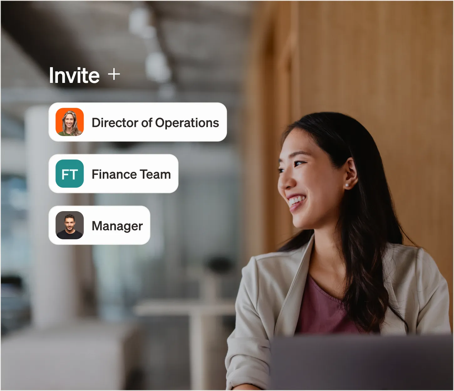 Woman smiling in office with invite options: Director of Operations, Finance Team, and Manager shown on screen.