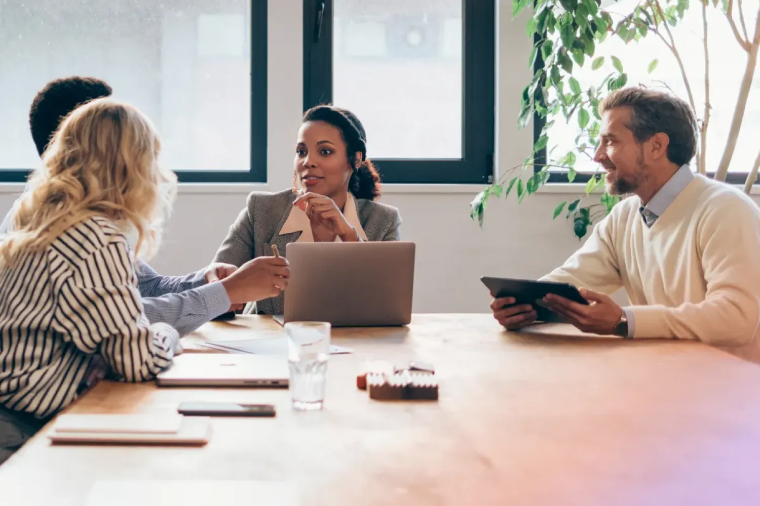Two women looking at a piece of paper