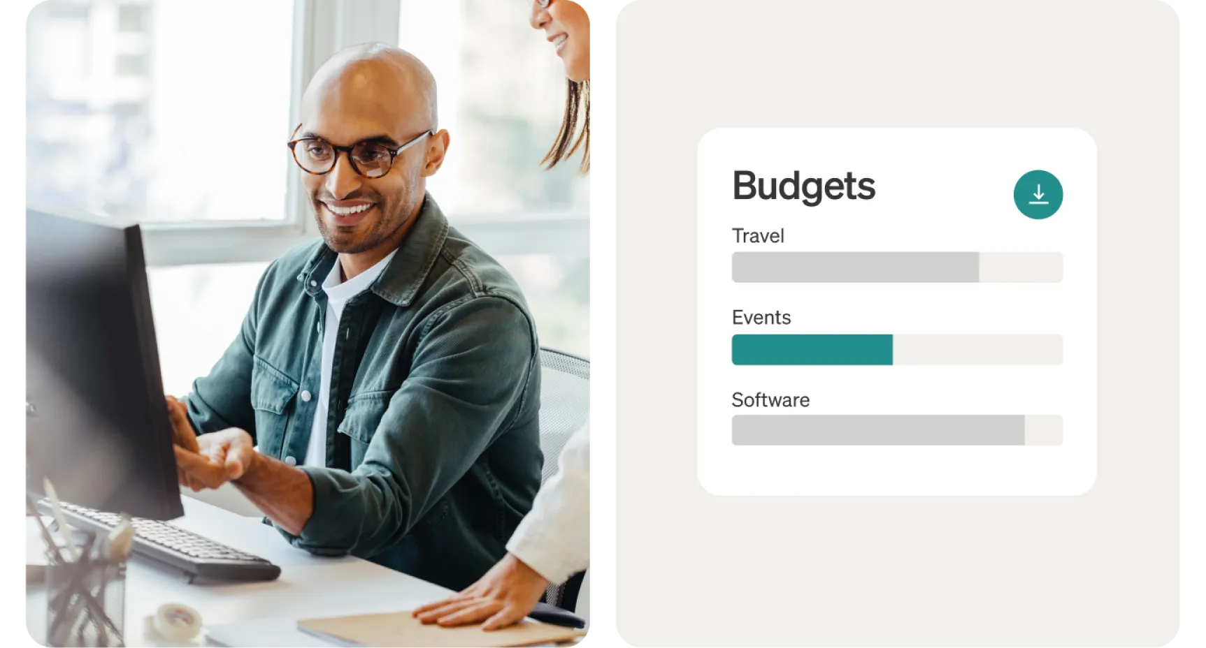 A smiling man discusses information on a computer monitor with a colleague, information for Budgets with categories Travel, Events, and Software are visible.