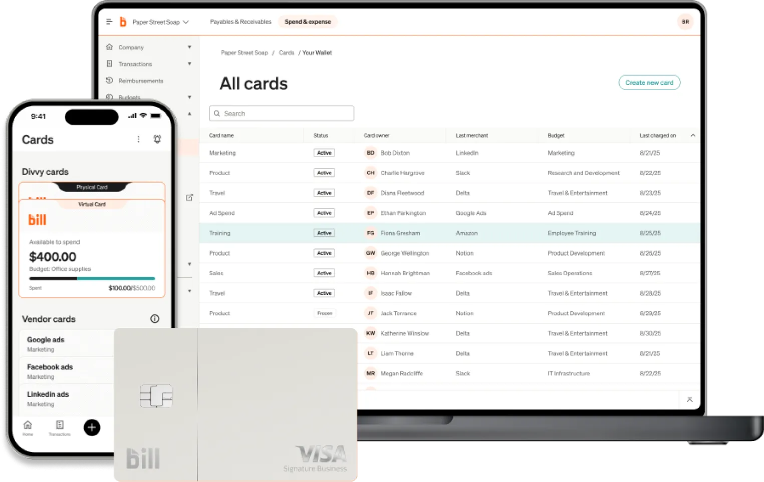 A smartphone and laptop displaying a BILL dashboard for All Cards, a BILL Divvy Card sits in front.