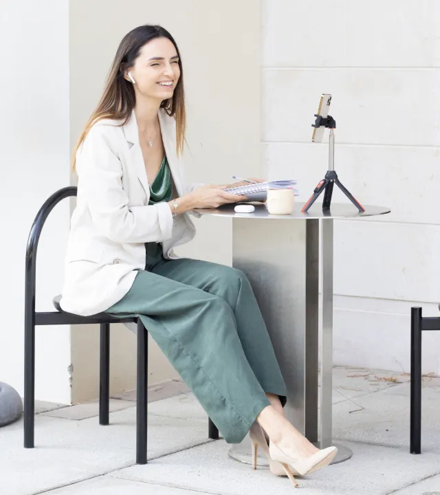 Katerina Gorbacheva recording a video with mobilephone.