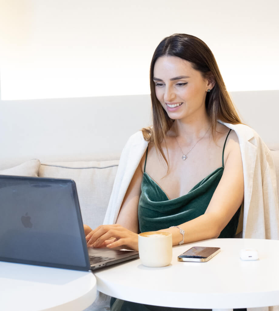 Business women Katerina Gorbacheva working on laptop