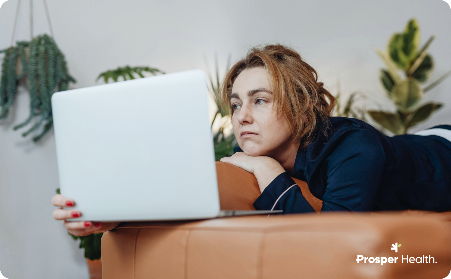 Autistic woman looking at her computer feeling left out