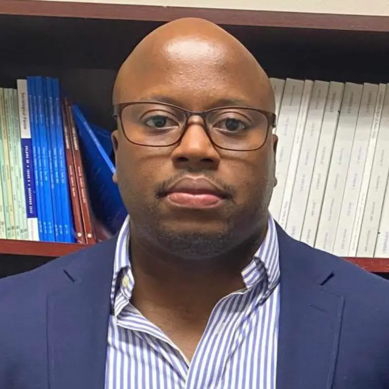 Headshot of James Abiola