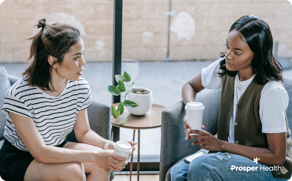 Two women talking, presumably in a therapeutic setting.