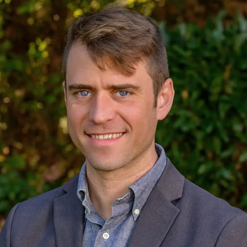 Headshot of Andrew Grego
