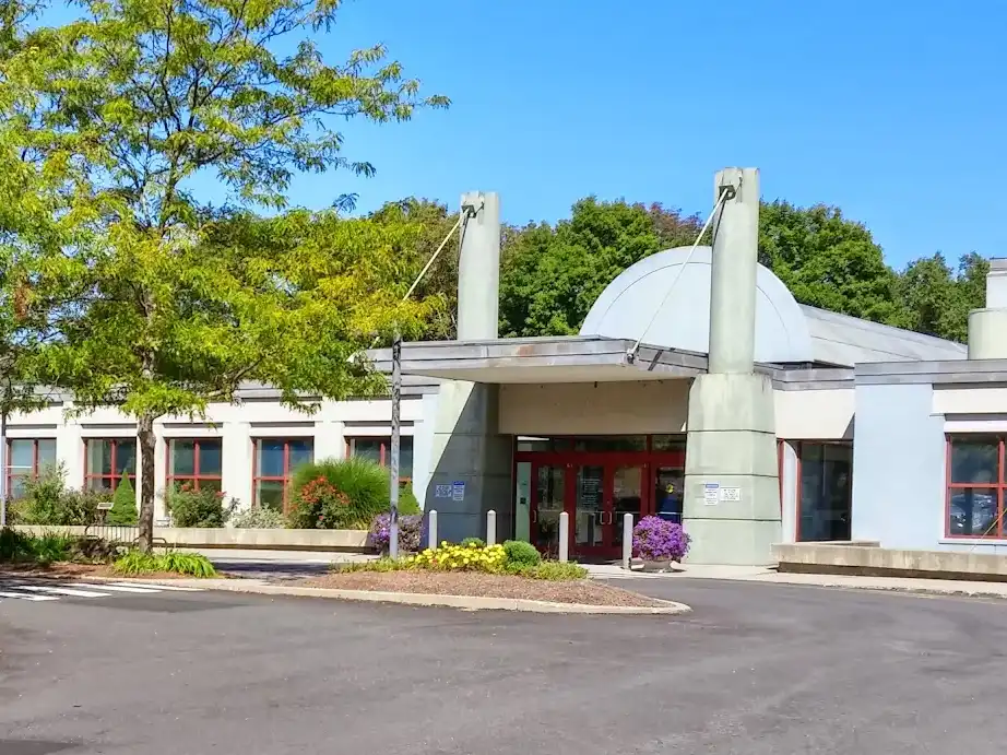 Exterior of the JCC of Greater New Haven in Woodbridge, CT, featuring the main entrance