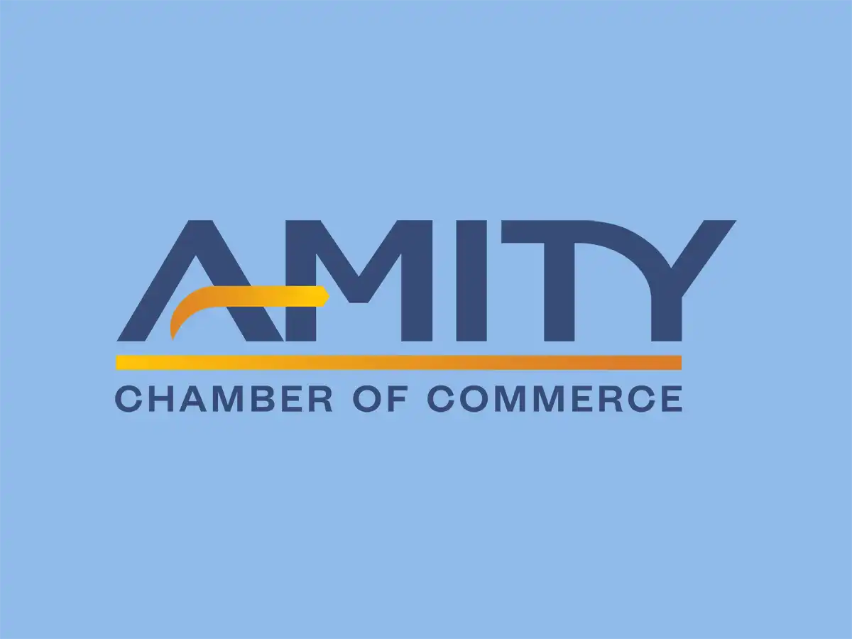 A blue and yellow logo for the Amity Chamber of Commerce, featuring a stylized 'A' with a yellow swoosh and the text 'AMITY CHAMBER OF COMMERCE' below.
