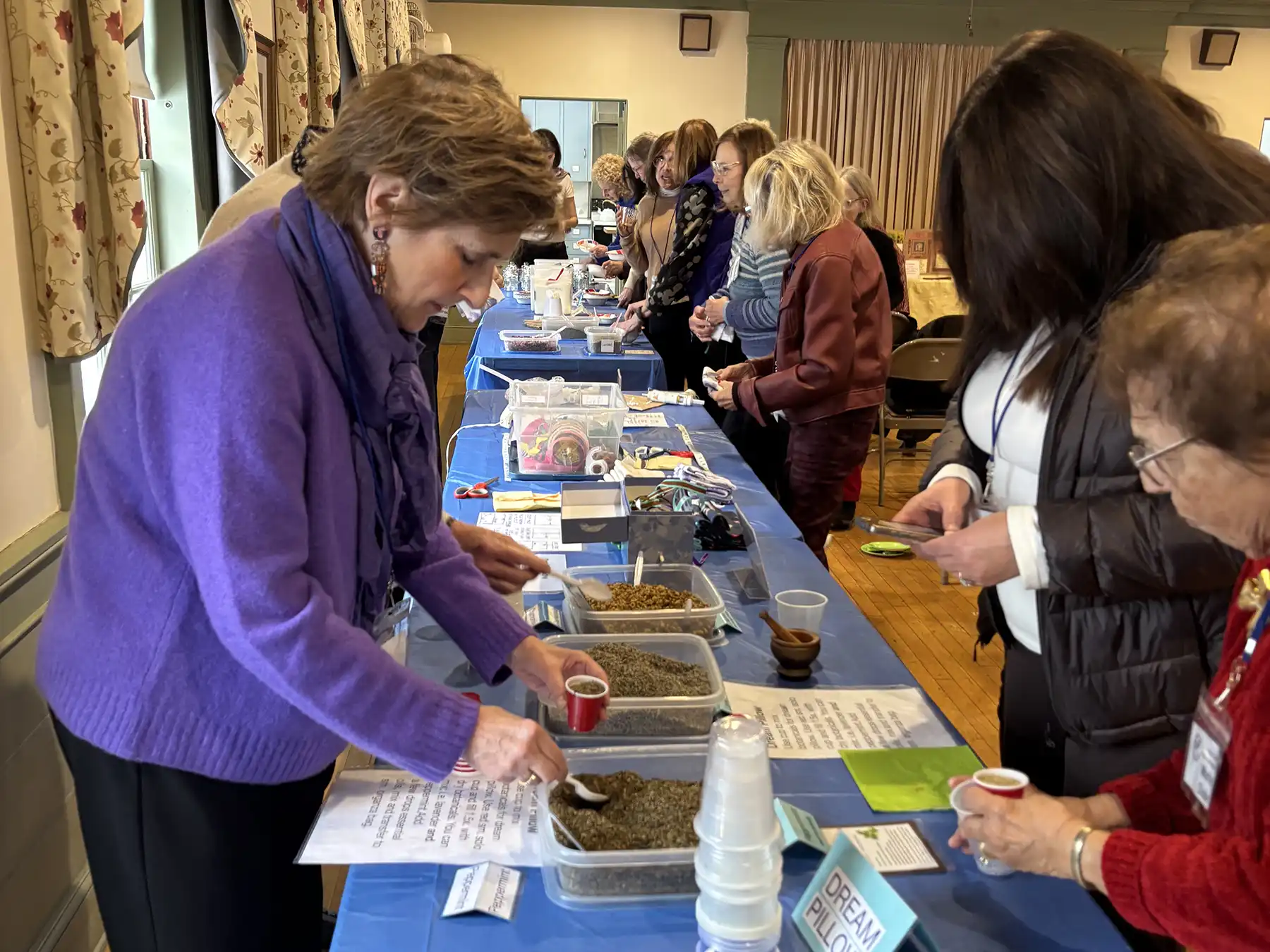 Garden Club members create DIY aromatherapy dream pillows with herbs and essential oils at a workshop led by Kim Larkin of Klassic Kreations.