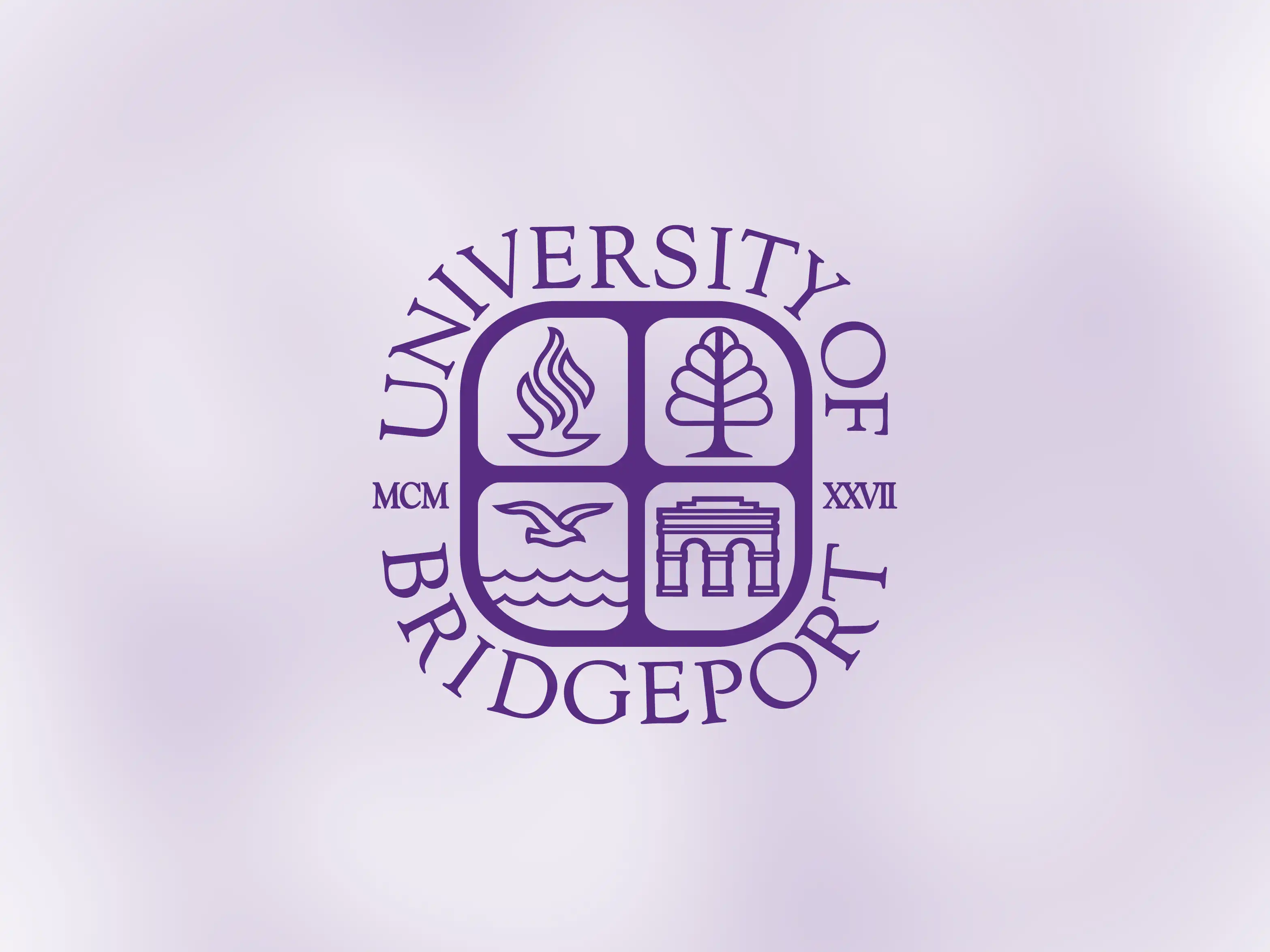 University of Bridgeport logo featuring its distinctive seal with an open book, torch, tree, winged bird over water, and the iconic Barnum Museum building. The seal is encircled by "University of Bridgeport" and "MCMXXVII" (1927), the university's founding year, set against a light purple background.