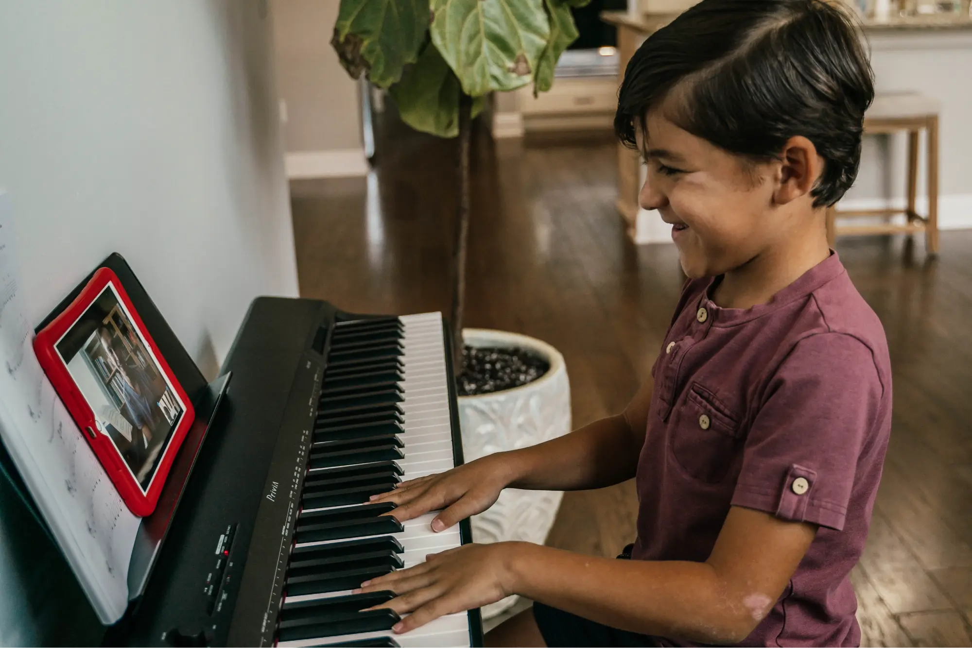 Virtu.Academy student playing piano