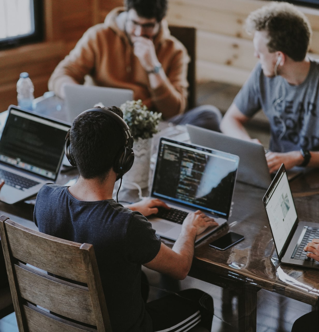 A man using his laptop to get in contact with Sky Edge IT after a security breach.