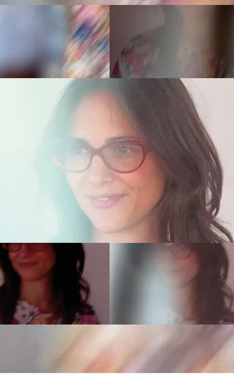 Model wearing Rewind Eyewear Happy Birthday, cat-eye frame inspired by 1990s Italian design.