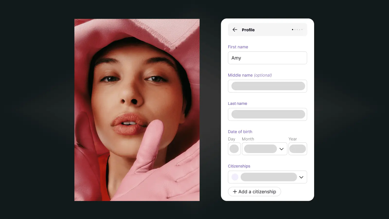 Mobile app profile screen showing fields for first name Amy, middle name, last name, date of birth, and citizenships next to a portrait of a woman wearing pink gloves and fabric framing her face.