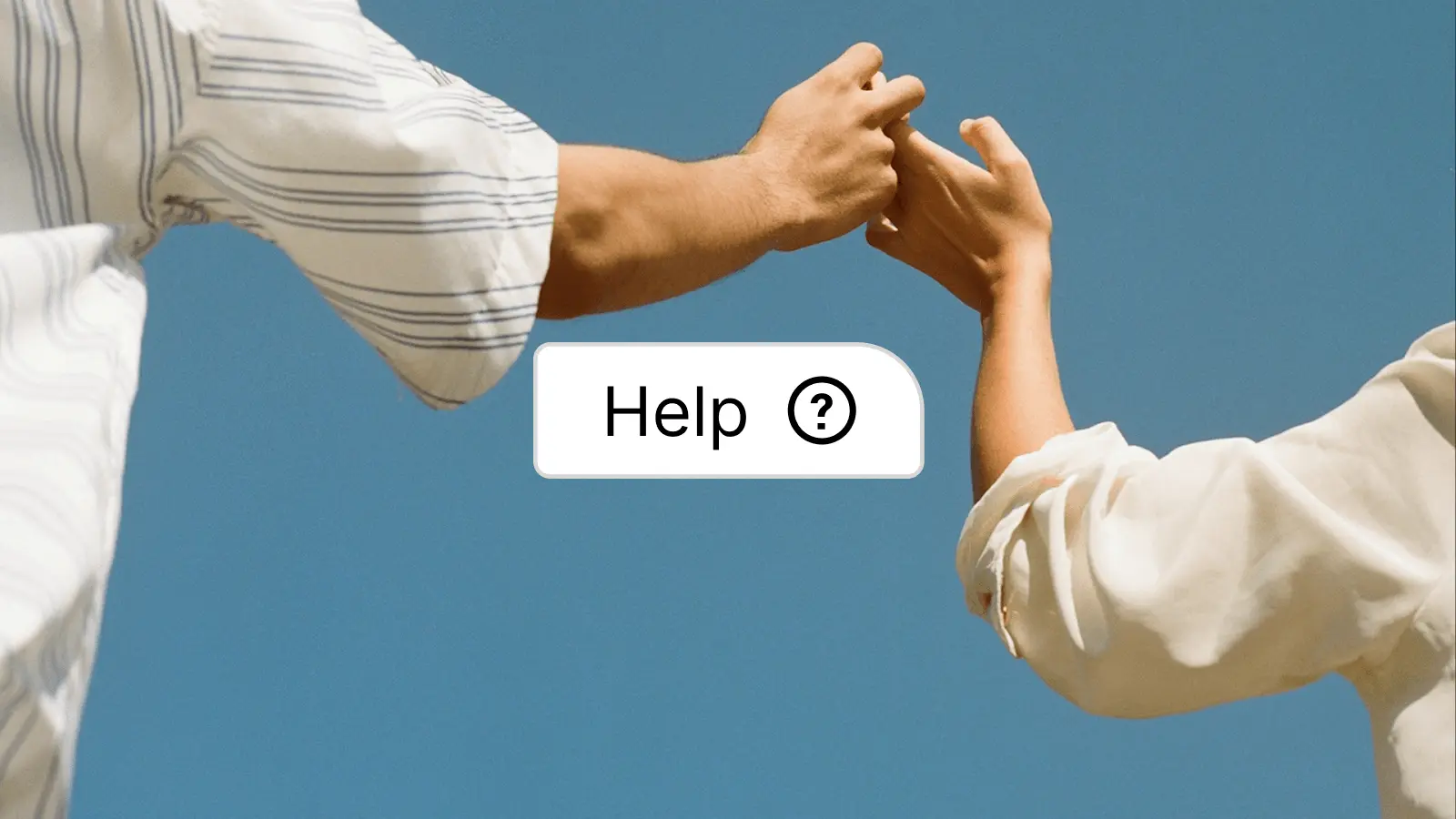 Two people reaching out to touch fingers against a clear blue sky with a help button overlay.