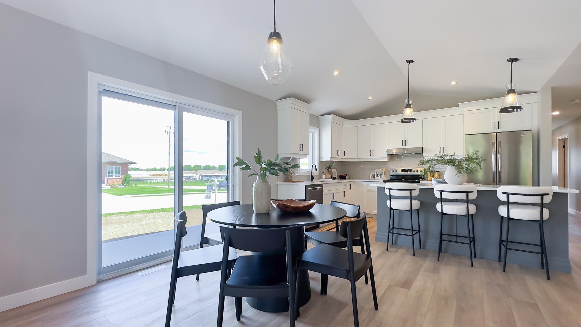 Dining area with open concept layout and natural light